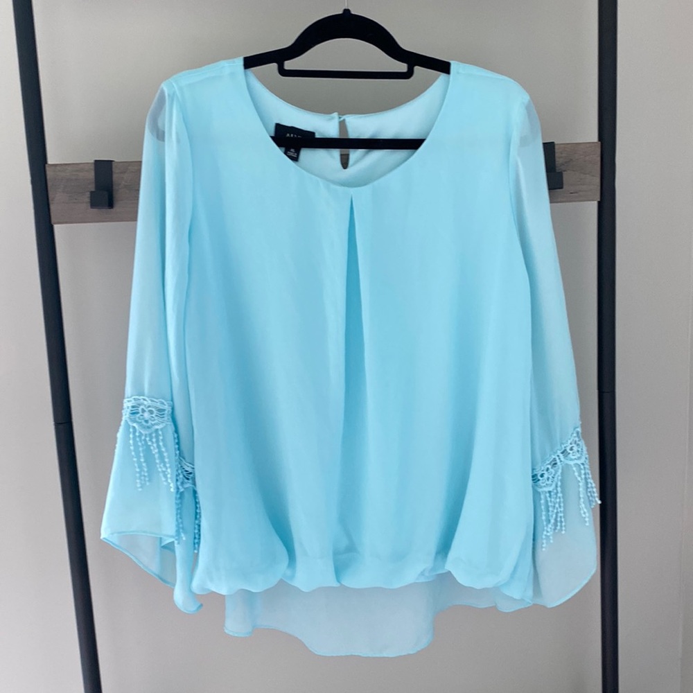 Turquoise women’s blouse